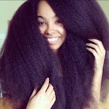 Once your hot tool is ready, run the plates of the flat iron over your strands. Black Straightened Hair With Curls Novocom Top