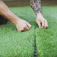 Artificial grass installation can take from 5 to 12 hours to install on average for any lawn small to average size. How To Install Artificial Grass Buzzgrass Laying Artificial Grass Artificial Grass Installation Diy Artificial Grass