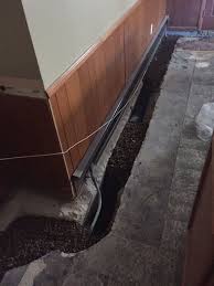 Interior Drain Tile System In Edina Affordable Egress Windows Basement Waterproofing Llc 763 267 3891 Egress Window Waterproofing Basement Drain Tile