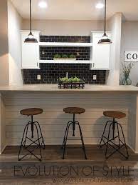 This huge basement bar area is the ideal spot for entertaining. A Modern Farmhouse Tour Evolution Of Style Modern Basement Basement Remodeling Basement Kitchen