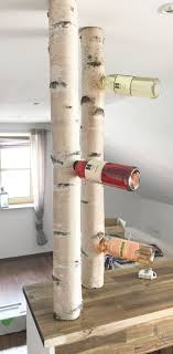 Ein Weinregal Aus Weissen Birkenstammen Von Birkendoc Wahnsinnig Dekorativ Bi Ein Weinregal Aus Weissen Birken Weinregal Birkenstamm Selbstgemachtes Weinregal