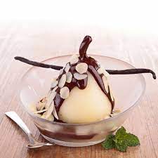 Tous En Cuisine La Recette De La Poire Belle Helene Et Creme Chantilly De Cyril Lignac Femme Actuelle Le Mag
