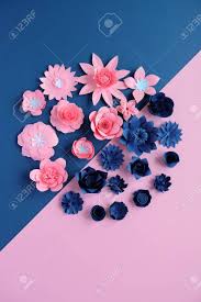 Maybe you would like to learn more about one of these? Blue Paper And Pink Paper Flowers On Dark Blue And Pink Background Cut From Paper Stock Photo Picture And Royalty Free Image Image 135738083