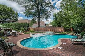 The right hot tub cover will help to retain and regulate heat, while keeping debris out and creating a safer hot tub installation. 15 Spectacular Private Swimming Pool Designs With A Hot Tub