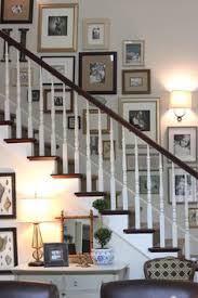 Black And White Gallery Wall Stairs How To Mix Black And White With Color On A Gallery Stair Wall Google Search Casas Decoracao Com Quadros Decoracao De Casa