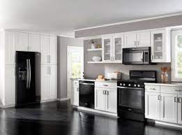 The faces at the table are all absolutely different. Decorating Around Black Appliances