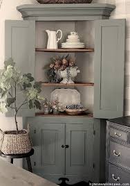 Early china cabinets were wooden china cabinets and ranged in style from chippendale to queen anne and, later, federalist and georgian style. Primitive Corner Cabinet Painted Green Hymns And Verses