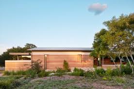 The solarium is a modern addition to a historic craftsman house. River Ranch By Jobe Corral Architects Dwell