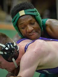 Trojans, Scots dominate mats at Melvin Douglas Invitational