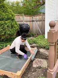 The white contrasts beautifully against the dark green leaves and bright colors of the flowers. Diy Backyard Vegetable Garden Progress Andnotor Home With Keki