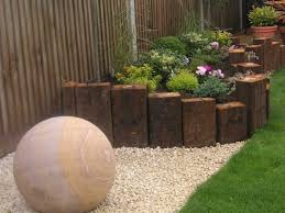 Image Result For Upright Sleeper Retaining Wall Building A Raised Garden Raised Garden Sleepers In Garden