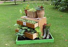 Pallet compost bin, vintage wagon planter, old barrel planter, can bird houses. 15 Remarkable Recycled Gardening Ideas Garden Lovers Club
