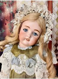 These sweet little Raggedies are approx. 3" . They have dyed wool hair from  a local farm, a wool felted body, glass eyes, are made with a professional  doll clay, and blushed