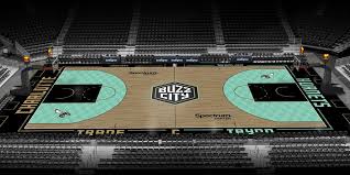 The old hornets experimented with the honeycomb theme, but the edges of each honeycomb were so dark as to overwhelm every other design element. Hornets Unveil New Court Design