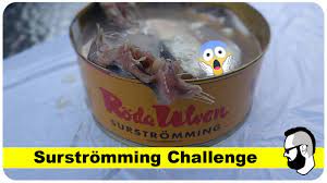 Swedes recommend opening a can only when you're outdoors. Surstromming Challenge Deutsch Pommes Man Youtube