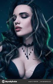Portrait of young sexy gothic girl with long hair Stock Photo by ©alexvolot  139738158