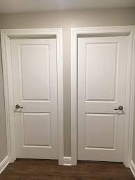 The panels are stacked in a traditional shaker style. 2 Panel Raised Interior Doors Vs Flat Panel Interior Door Styles Door Design Interior Cottage Interior