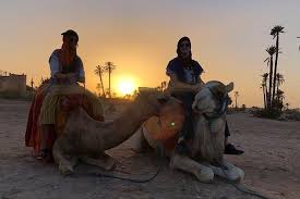 Observe the traditional daily life of the locals in the neighboring villages. Spacetraveller Activity Sunset Camel Ride Tour In