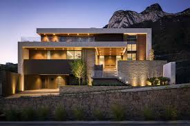 Innovative wall cladding materials, reflective glass, use of natural stone and wood make this signature villa stand out with unique exterior. Modern Luxury House Plans Designs House Plans 177650