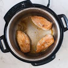 Add the onion and cook until translucent, around 4 minutes, add the chicken thighs, frozen and cook until the skin is golden, around 3 minutes. Instant Pot Lemon Garlic Chicken With A Creamy Sauce