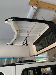 After trying to lift my hard top off alone with my old man 's back i heeded my subscriber's advice and made a simple hoist for my garage for just over $30. Gladiator Hardtop Hoist Jeep Gladiator Forum Jeepgladiatorforum Com