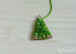 You can use the same idea to make yourself a festive bracelet! Yarn Wrapped Christmas Tree Ornaments Easy Peasy And Fun