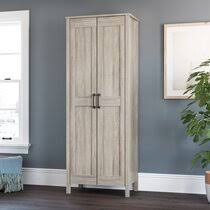 The cabinet is made out of walnut. Tall Narrow Storage Cabinet Wayfair Ca