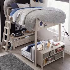 The bed is set into a wall nook with night lights and. Hampton Convertible Loft Bed With Couch Pottery Barn Teen