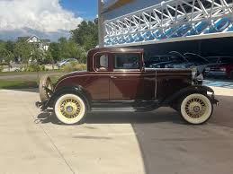 Image result for Viceroy Maroon 1931 Oldsmobile