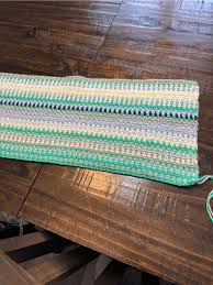 Hi! I'm new to this group. I recently joined because I am starting my own  temperature blanket. I am a self taught crocheter thanks to YouTube. Here  is my blanket as of