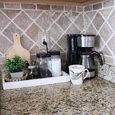 However, there are engraved wall shelves above it that add a unique touch. Coffee Bar Ideas On Kitchen Counter Coffee Bar Ideas Small Spaces Coffeebar C Home Coffee Stations Coffee Bar Kitchen Counter Organization