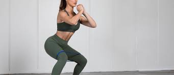 Bands for the squat the first way to attach bands for the squat is from the band peg directly to the collar of the barbell. How To Do Resistance Band Squats 5 Variations Fitplan Blog