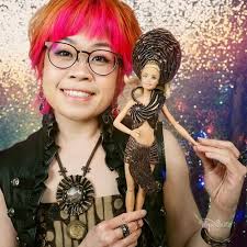 Local jeweler wins foldforming contest with a tribal dress for Barbie