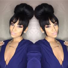 The blunt bangs give this hairstyle a fierce and chic tone. Bun X Bangs Natural Hair Styles Weave Hairstyles Short Hair Styles