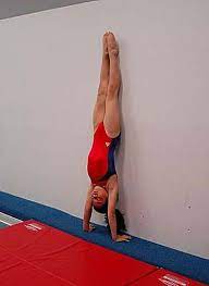 Participants perform exciting routines made up of dynamic skills, choreography and apparatus techniques. How Do You Perform A Headstand Handstand Press Handstand Headstand