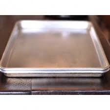 How To Make A Disgusting Cookie Sheet Look Brand New Clean Cookie Sheets Clean Baking Pans Cleaning Hacks