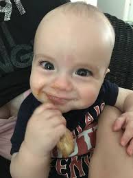 Normal baby poop frequency and smell at 6 months?