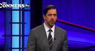 Aaron rodgers laughs off hilarious answer on 'jeopardy!'. Aaron Rodgers Once Again Hosting Jeopardy This Time On An Episode Of The Conners