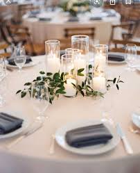 Pin By Heather Anderson On Glo Wedding In 2020 Round Wedding Tables Wedding Table Centerpieces Wedding Floral Centerpieces