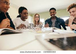 Stock Photo Happy Young University Students Studying With Books In College Group Of Multiracial People In Classr Multiracial People Student Photo Multiracial