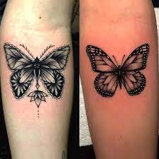 Ethan Hubbard Tattoos On Instagram Some Booterflies From Yesterday On Two Different Clients Slowly Becoming The Butterfly Hand Tattoos Tattoos Flower Tattoo