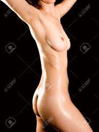 Closeup Of A Nude Wet Female Body In Front Of Black Background Stock Photo,  Picture And Royalty Free Image. Image 11077029.
