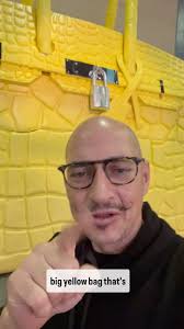 Great sculpture by #geoevents featured at Palm Beach Art Fair, repainted by  Denis Leon Gallery, booth 307. Come see us!!! #bigbirk #birkin #yellowbag  #birkinbag #geoevents #palmbeach #palmbeachartfair ...