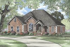 Arched openings over the garage doors and a metal accent roof are just two of the thoughtful exterior details that lend curb appeal to this craftsman home plan. Nelson Design Group House Plan 750 Cherry Street French Traditional House Plan