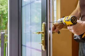 Solid Ground Locksmith technician working in Ogden