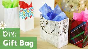 Wrapping paper is a great choice here too. Tutorial On How To Make Your Own Gift Bag Using Newspaper Wrapping Paper Drawing Paper Or Regular 8 5x11 How To Make A Gift Bag Easy Diy Gifts Gift Bags Diy
