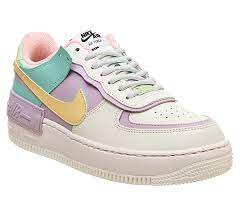 The nike air force shadow was initially designed to be a performance basketball shoe, to be worn on hardcourt and with features to help athletes grab air and improve movement. Nike Air Force 1 Shadow Trainers Pale Ivory Celestial Gold Tropical Twist Unisex Sportschuhe