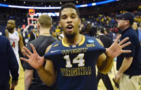 Gary Browne pops the jersey after West Virginia's 69-59 win over Maryland. 