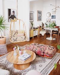 22 Bohemian Decor Essentials For Boho Chic Style Boho Swingasan In Bohemian Living Room With Ha Boho Living Room Decor Decor Essentials Bohemian Style Decor