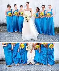 Being a bridesmaid at a wedding is all about supporting a bride weeping over wilted flowers, frantically scouring nooks and crannies for sets of keys, and looking great in the at latterdaybride, the bridesmaid dress is no longer an item to be feared! Summery Farm Wedding With Blue And Goldy Yellow Blue Wedding Dresses Blue Bridesmaid Dresses Blue Bridesmaids